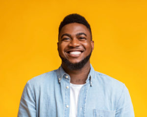 smiling man with dental veneers