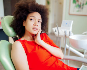 a woman with a toothache