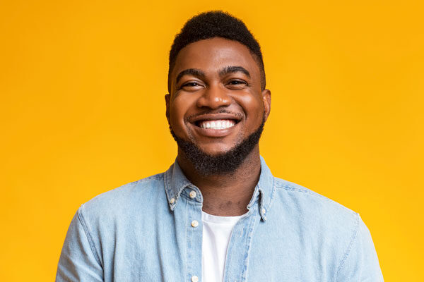 smiling man with dental veneers
